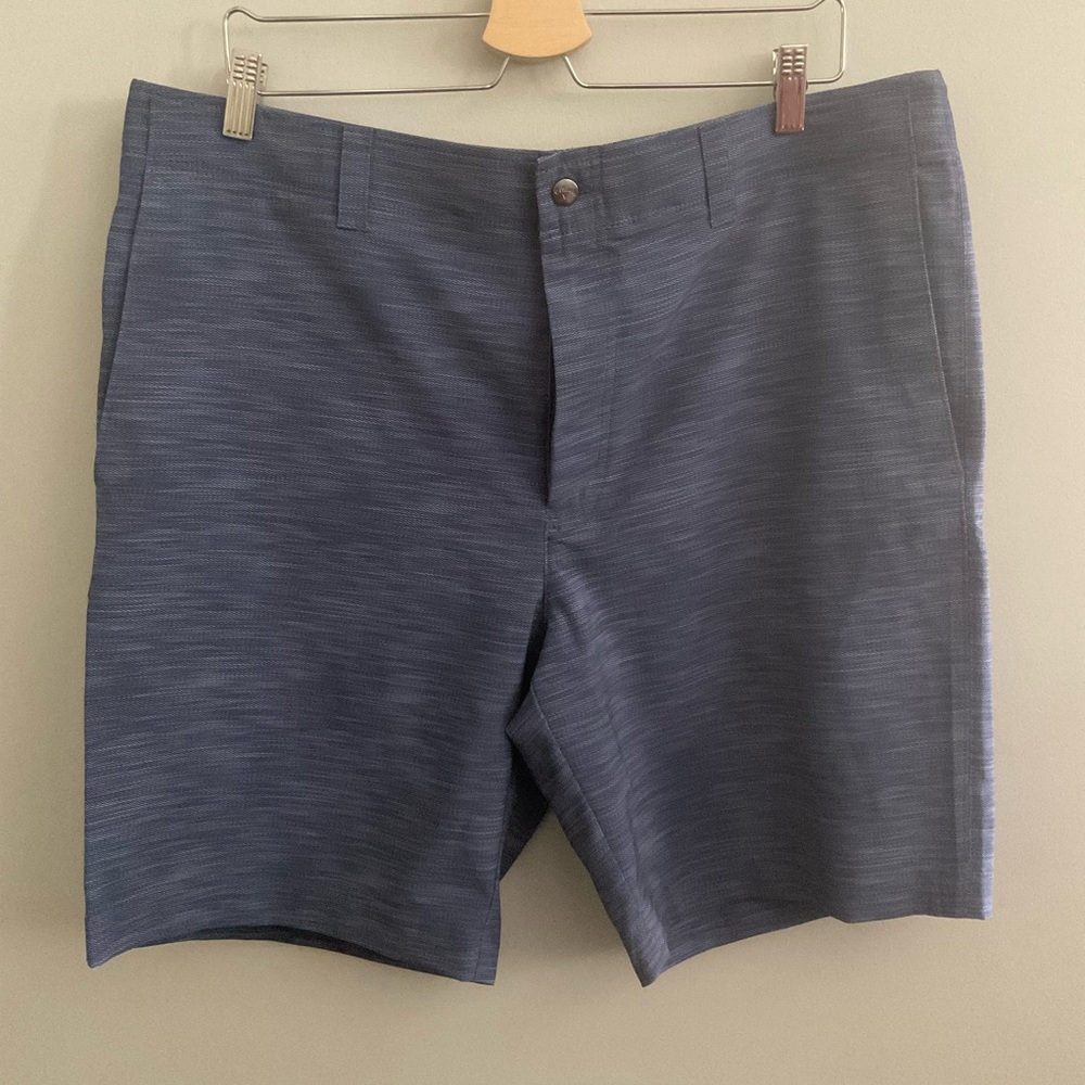 Callaway Men's Flat Front stretch Opti Dri Media pocket Shorts.